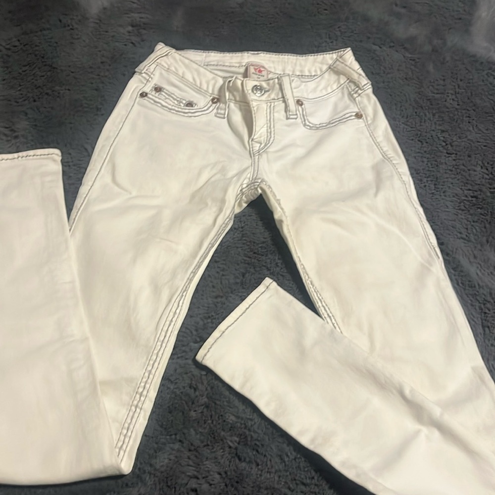 White boot cut true religion pants with grey stitching